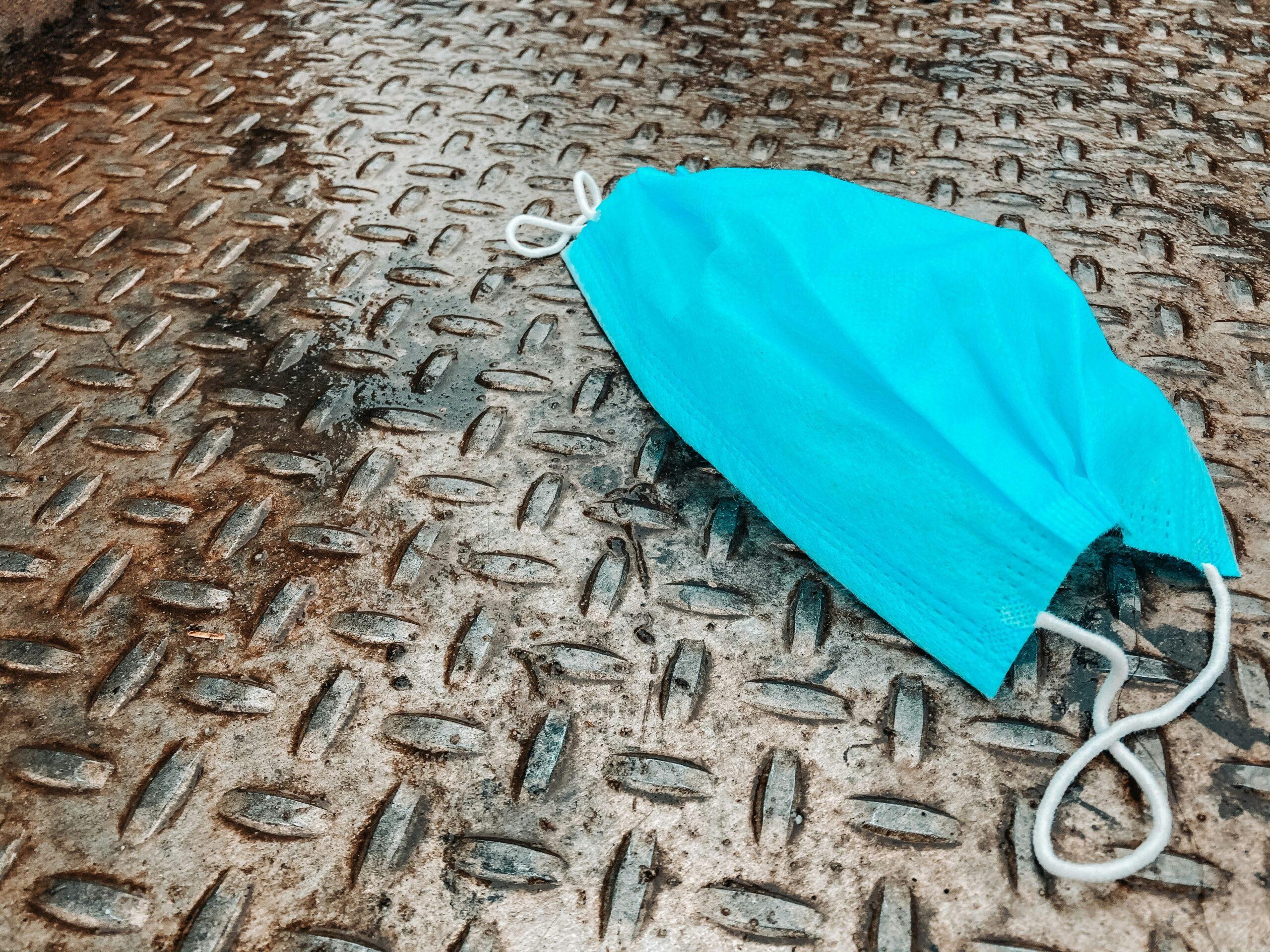 A broken elastic strap on a surfboard bag