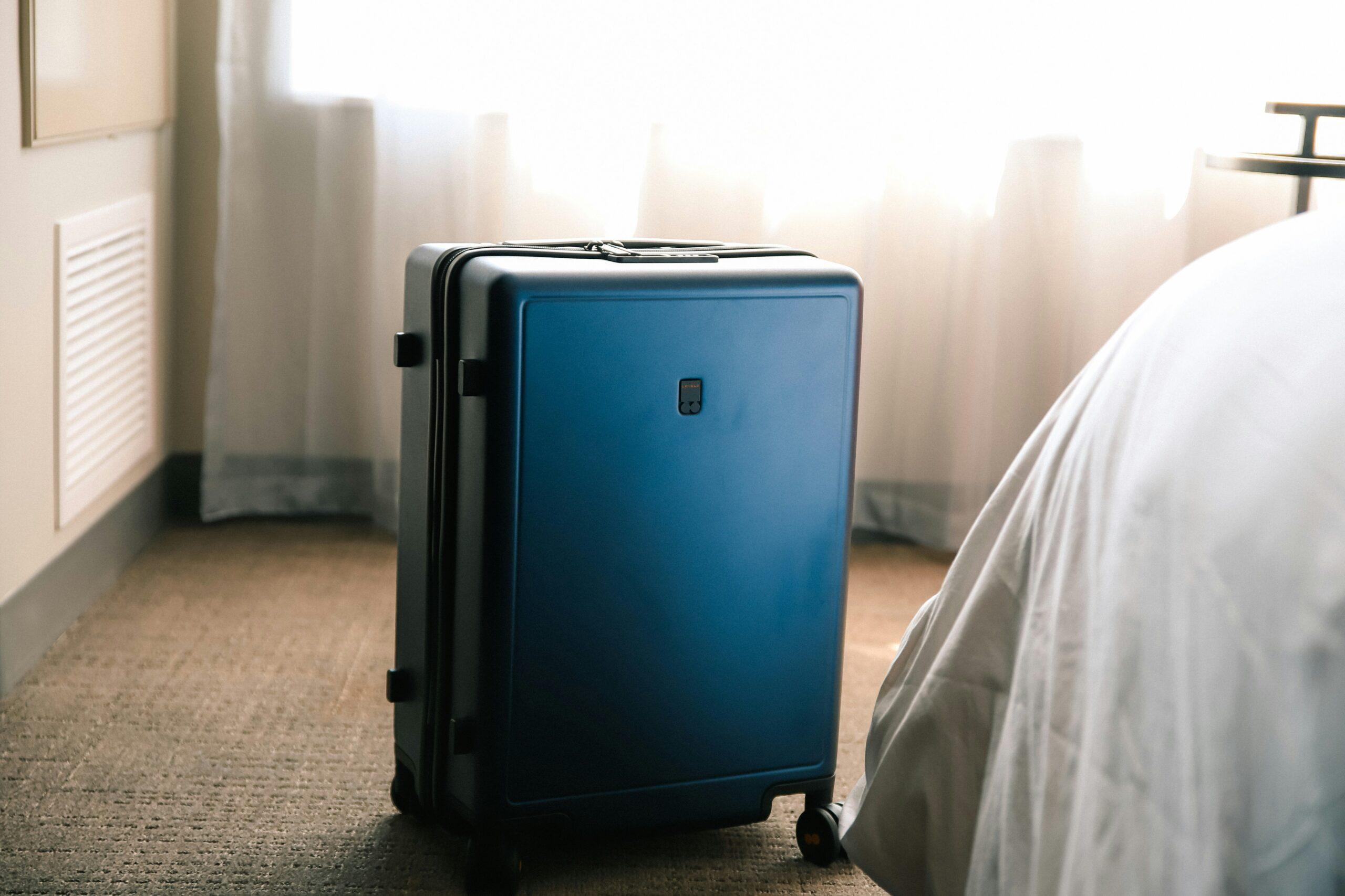 Funny meme showing a happy surfer rolling luggage effortlessly