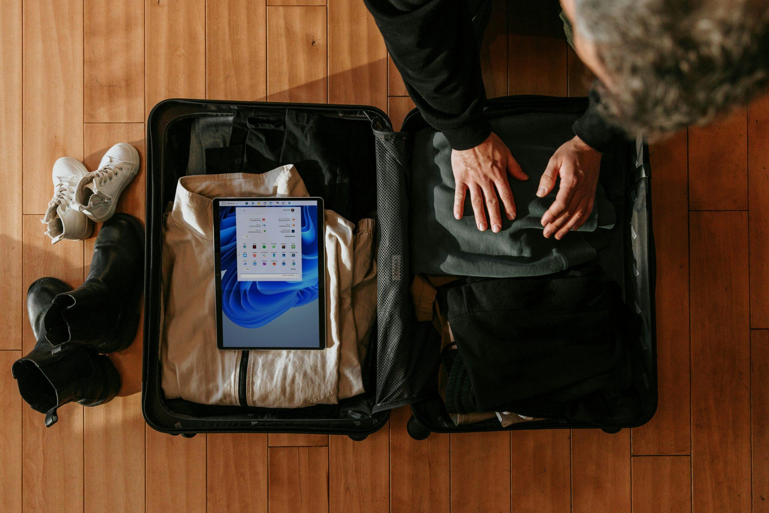 A well-packed surfboard luggage showing evenly distributed items inside