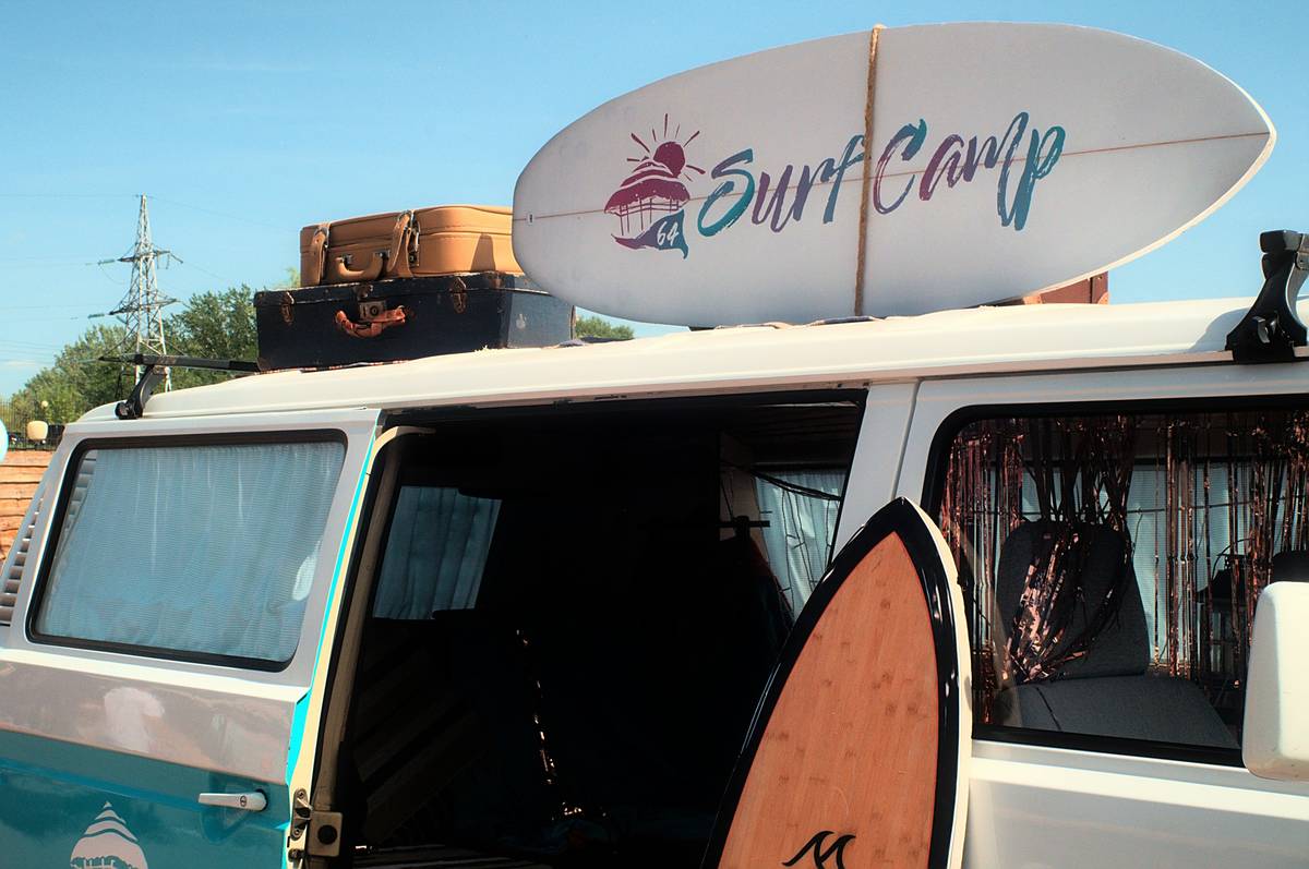 Close-up shot of a high-quality surfboard bag with multiple compartments