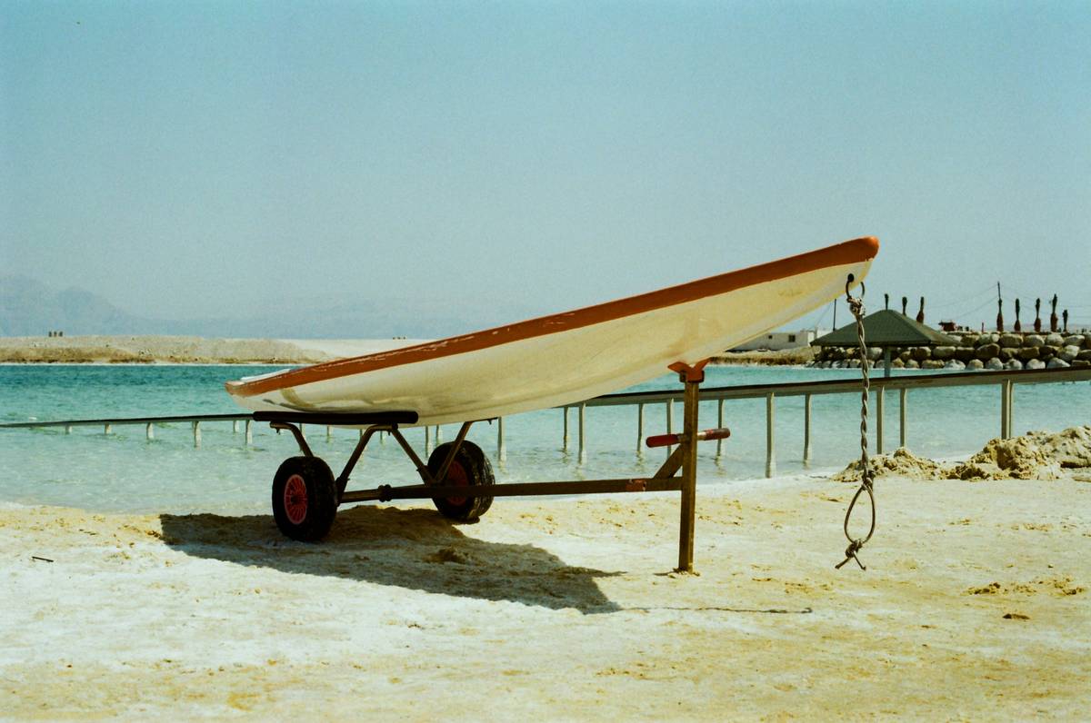 Damaged surfboard illustrating importance of surf transport case
