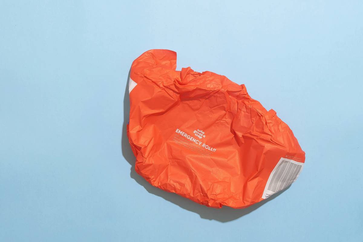 Features of a premium board vault bag including padding and waterproof seal