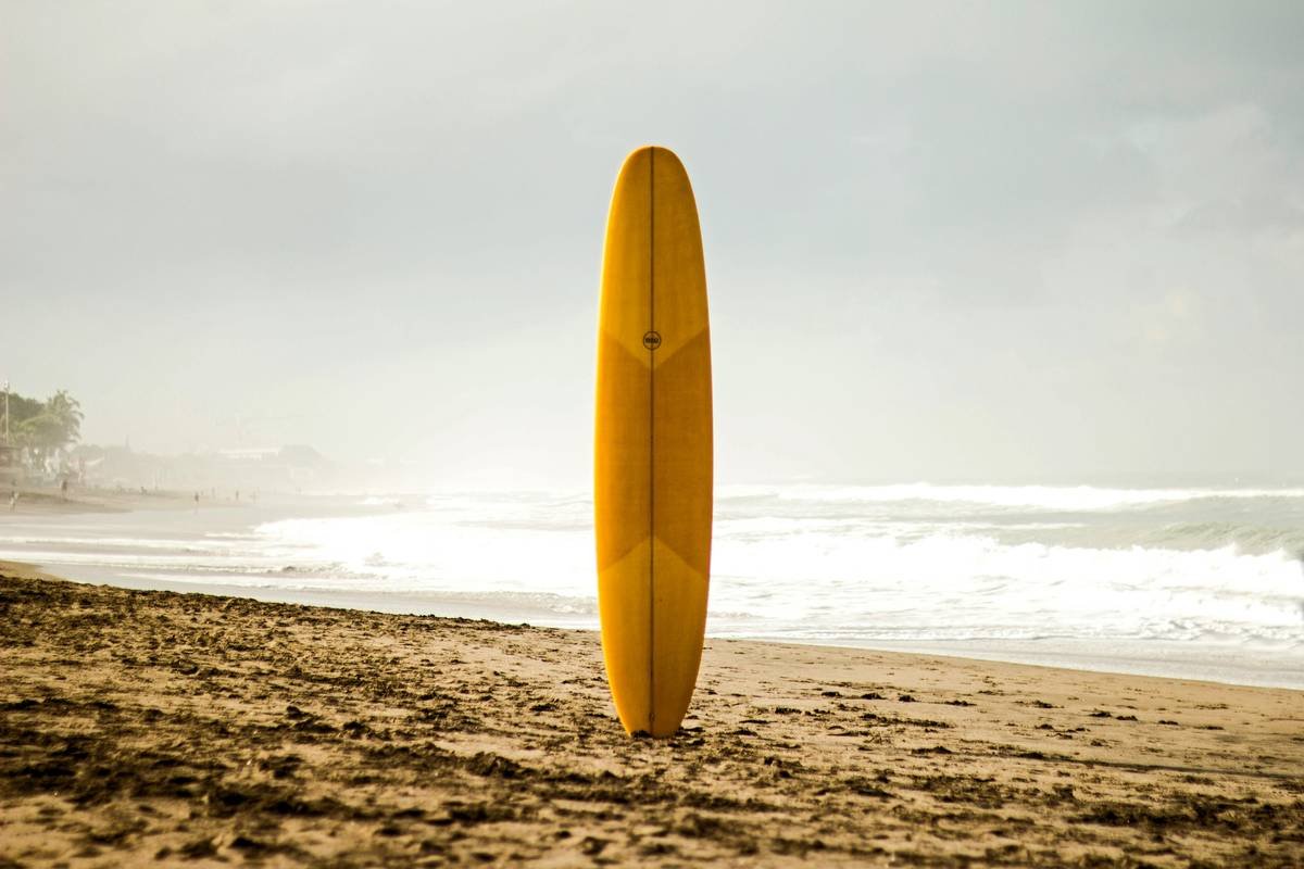 Step-by-step visual guide to packing surfboards for air travel inside a hard case